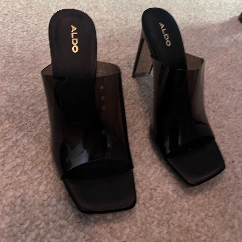 Translucent black sandals